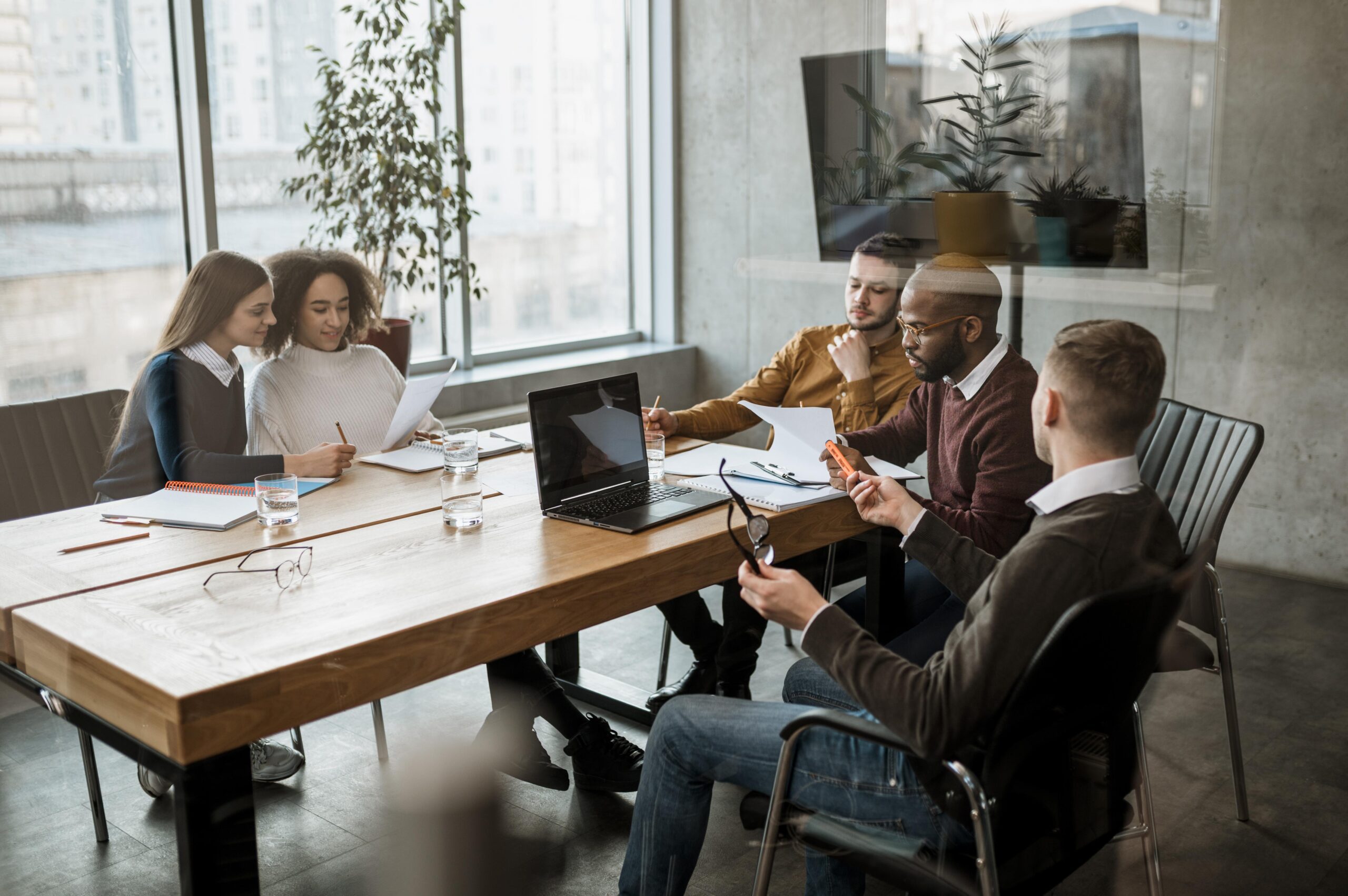 front-view-people-having-meeting-office